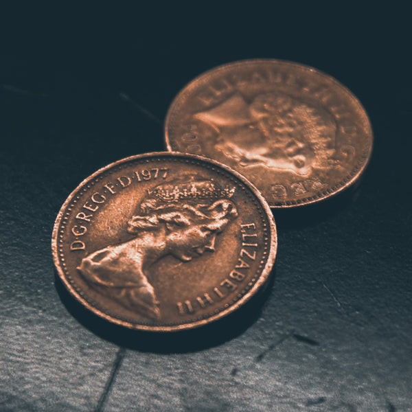 A Brief History of Coins: From Ancient Greek Drachmas to United States Dollars
